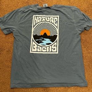 Nature backs tee